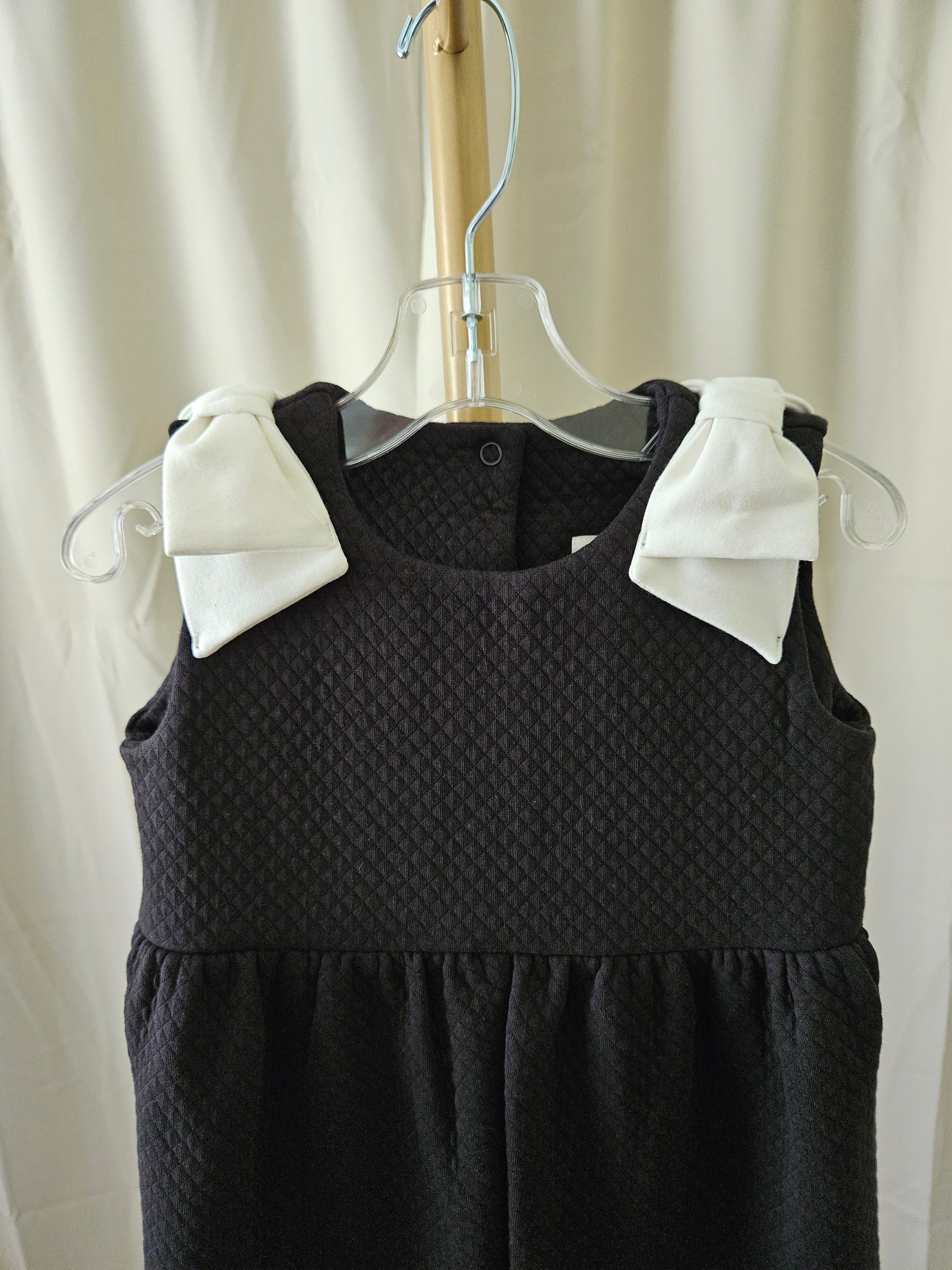 The Beaufort Bonnet Company Black Quilted Romper Pearl Bow Shoulder