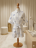 Rosa Clothing Blue & White Floral Bow Romper Blouse | Tie Waist | NWT