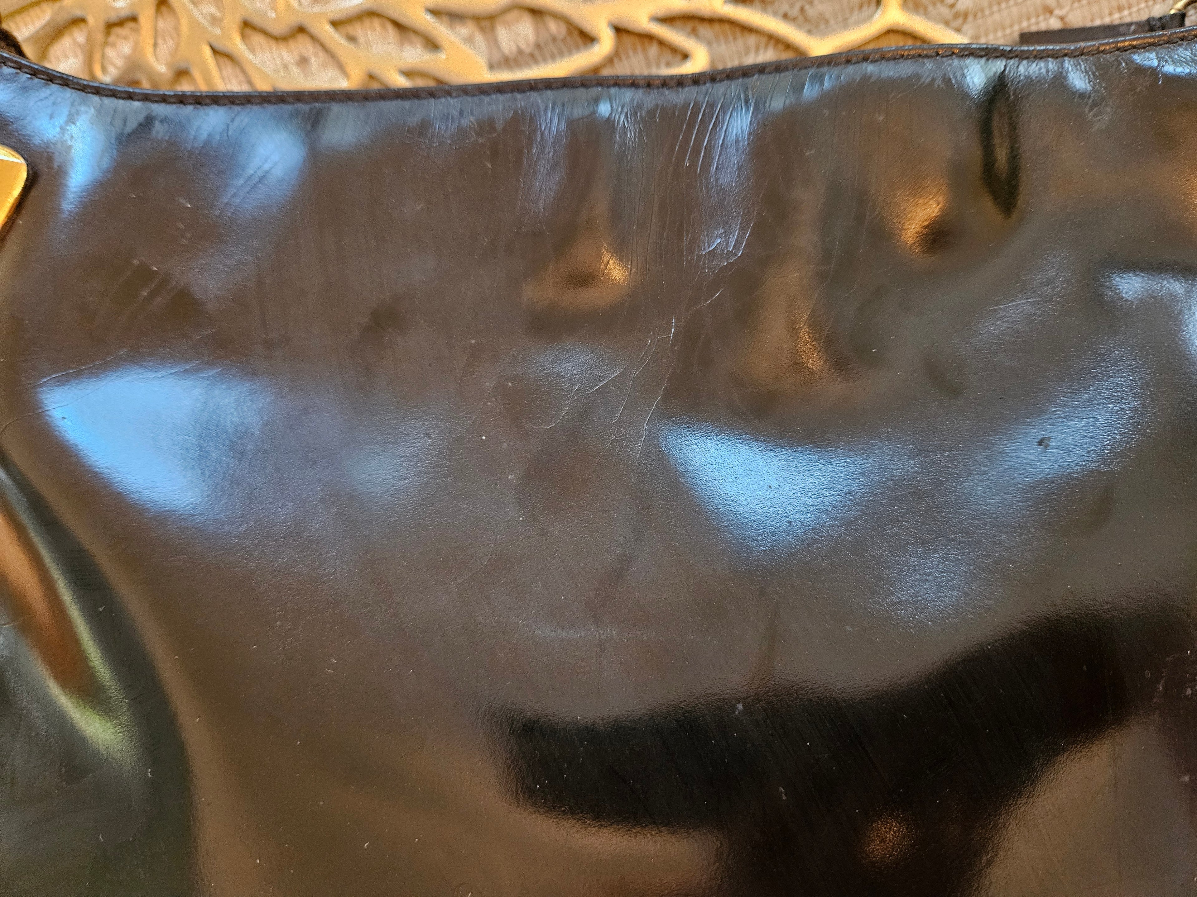 Preloved Vintage Authentic GUCCI 1970's Blk Patent & Gold handbag