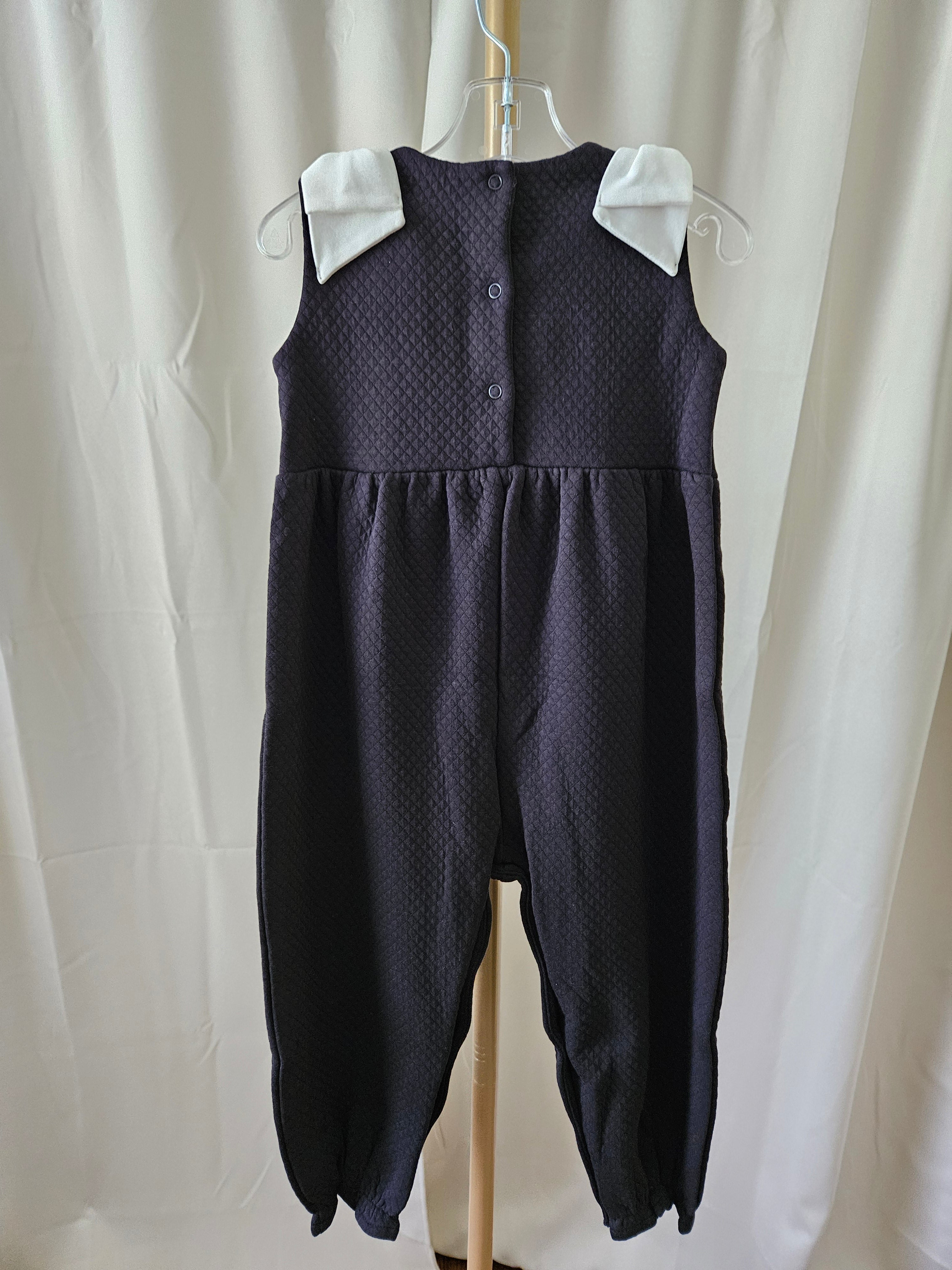 The Beaufort Bonnet Company Black Quilted Romper Pearl Bow Shoulder