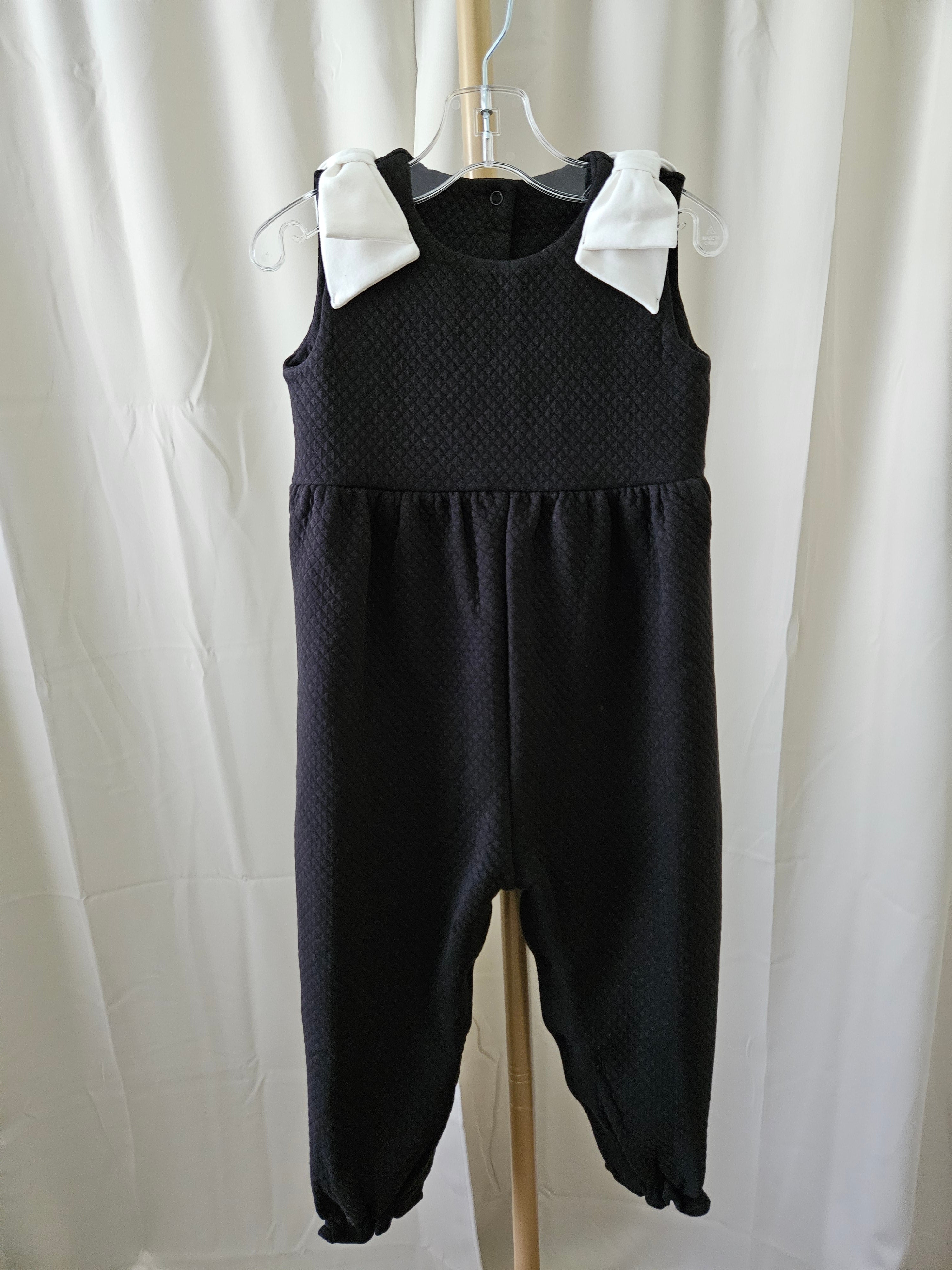 The Beaufort Bonnet Company Black Quilted Romper Pearl Bow Shoulder