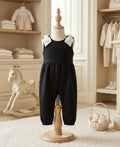 The Beaufort Bonnet Company Black Quilted Romper Pearl Bow Shoulder